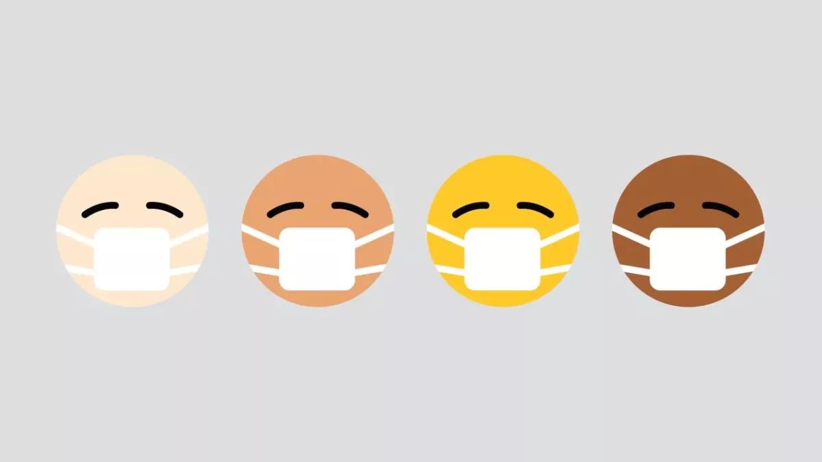 Vier Emojis mit Mund-Nasen-Schutz