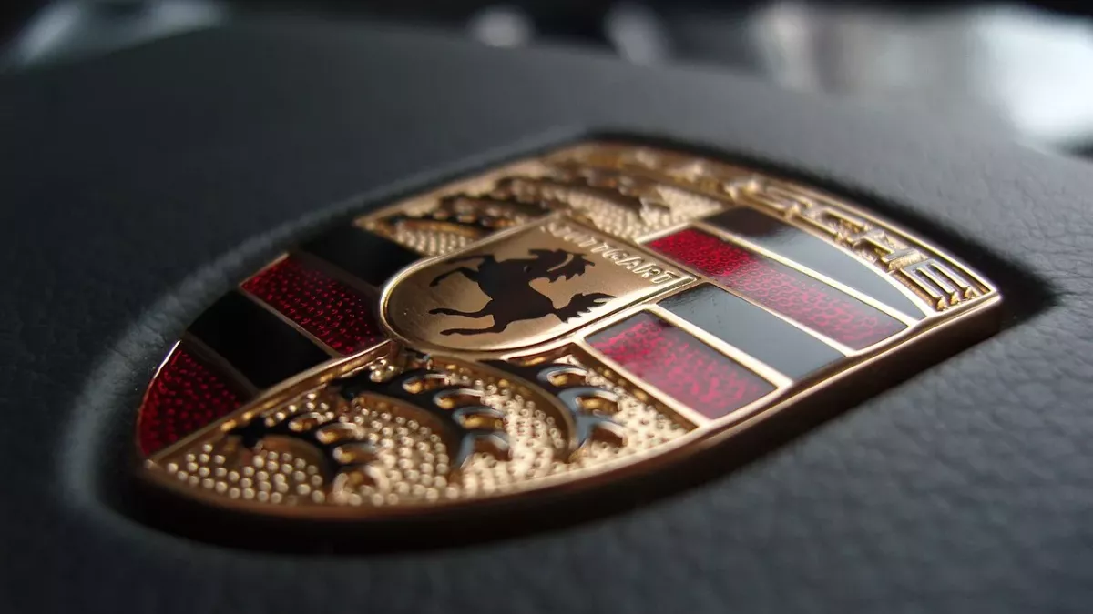 Porsche emblem on a steering wheel
