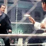 Steven Seagal im Käfig mit einem Taekwando-Schwarzgurt