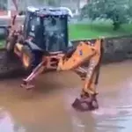 Bagger überquert Fluss