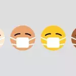 Vier Emojis mit Mund-Nasen-Schutz