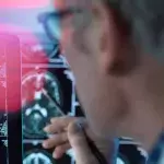 Doctor viewing brain scans for possible disease or damage in clinic 