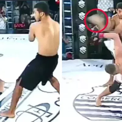 Kämpfer geht nach Fußkick zu Boden