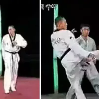 Kampf zwischen einem Taekwondo-Meister und einem Shaolin-Mönch
