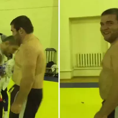 Der Trainingspartner von Nurmagomedov steckt kräftige Schläge in den Bauch locker weg