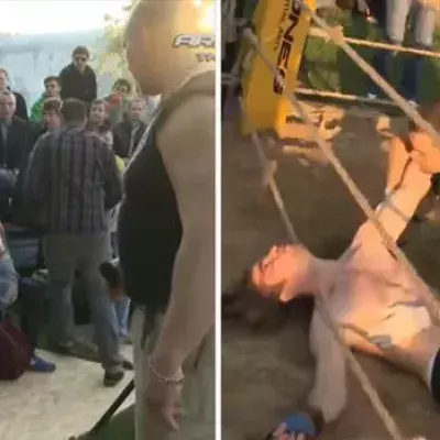 Ein Zuschauer schafft es bis zum Ring und stellt sich einem Boxer