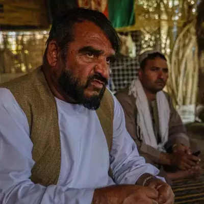 Der afghanische Polizist Azim Khan im Panjwai Viertel bei Kandahar, Afghanistan