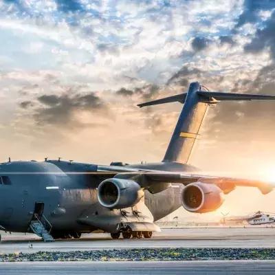 Large military transport aircraft at sunset