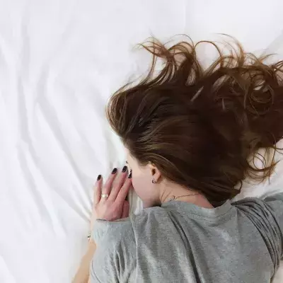 Müdigkeit zählt zu einem Symptom von Long Covid