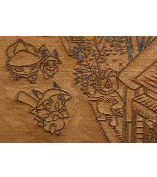 Holzschnitt einer Pokemon-Illustration